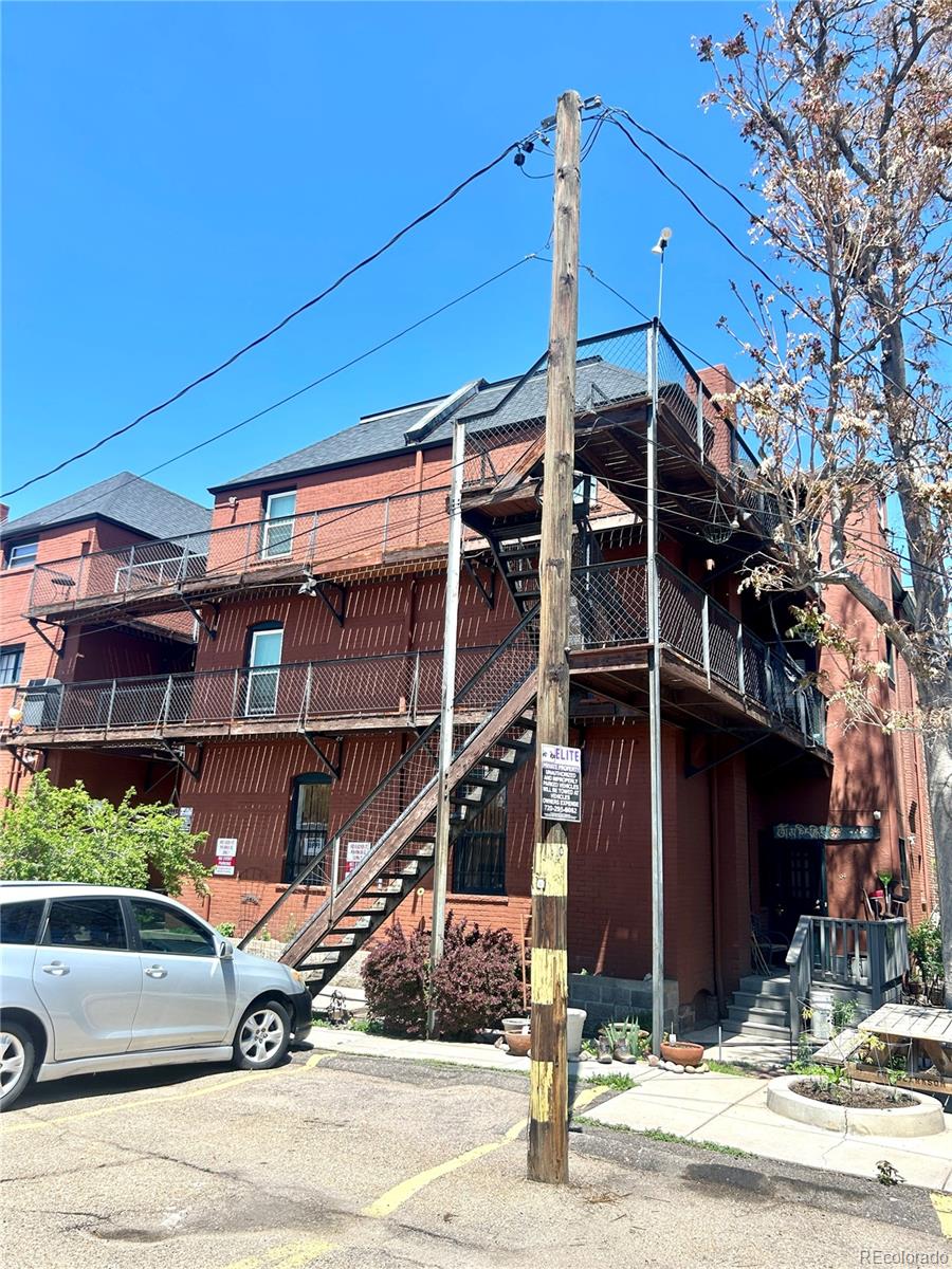 16-th 16-th E 16th Denver, CO 80203 - Photo 38 of 38 front view of a house with a street