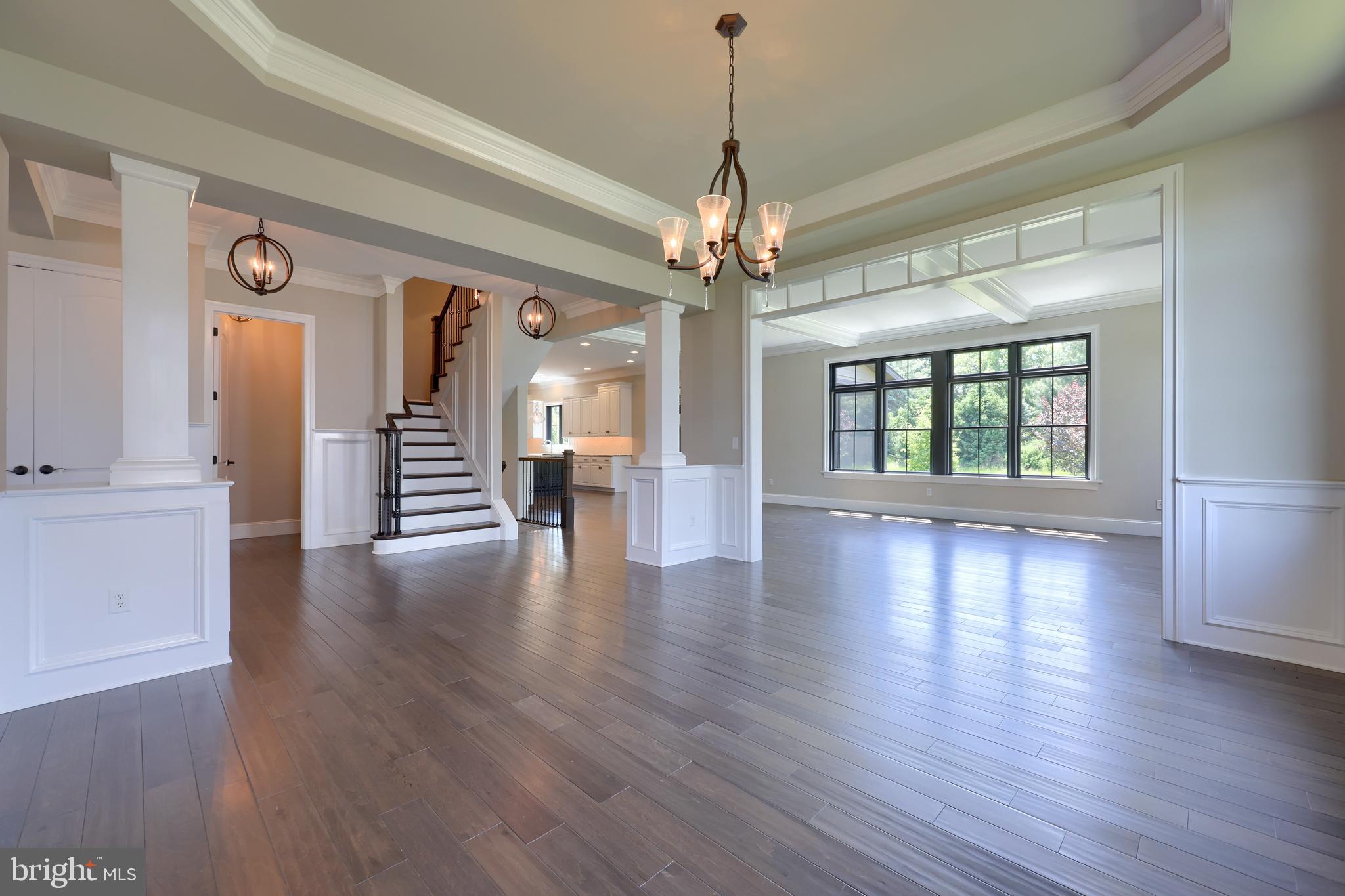 428 Southampton Drive Lititz, PA 17543 - Photo 17 of 60 a view of an empty room with wooden floor and a window