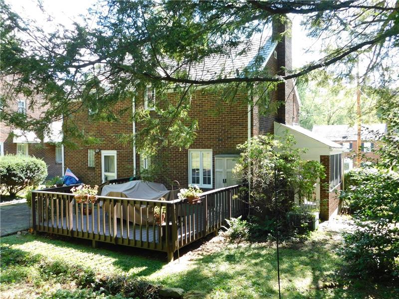 2367 Collins Road Pittsburgh, PA 15235 - Photo 22 of 25 Enjoy privacy or entertaining on the deck and flagstone patio.