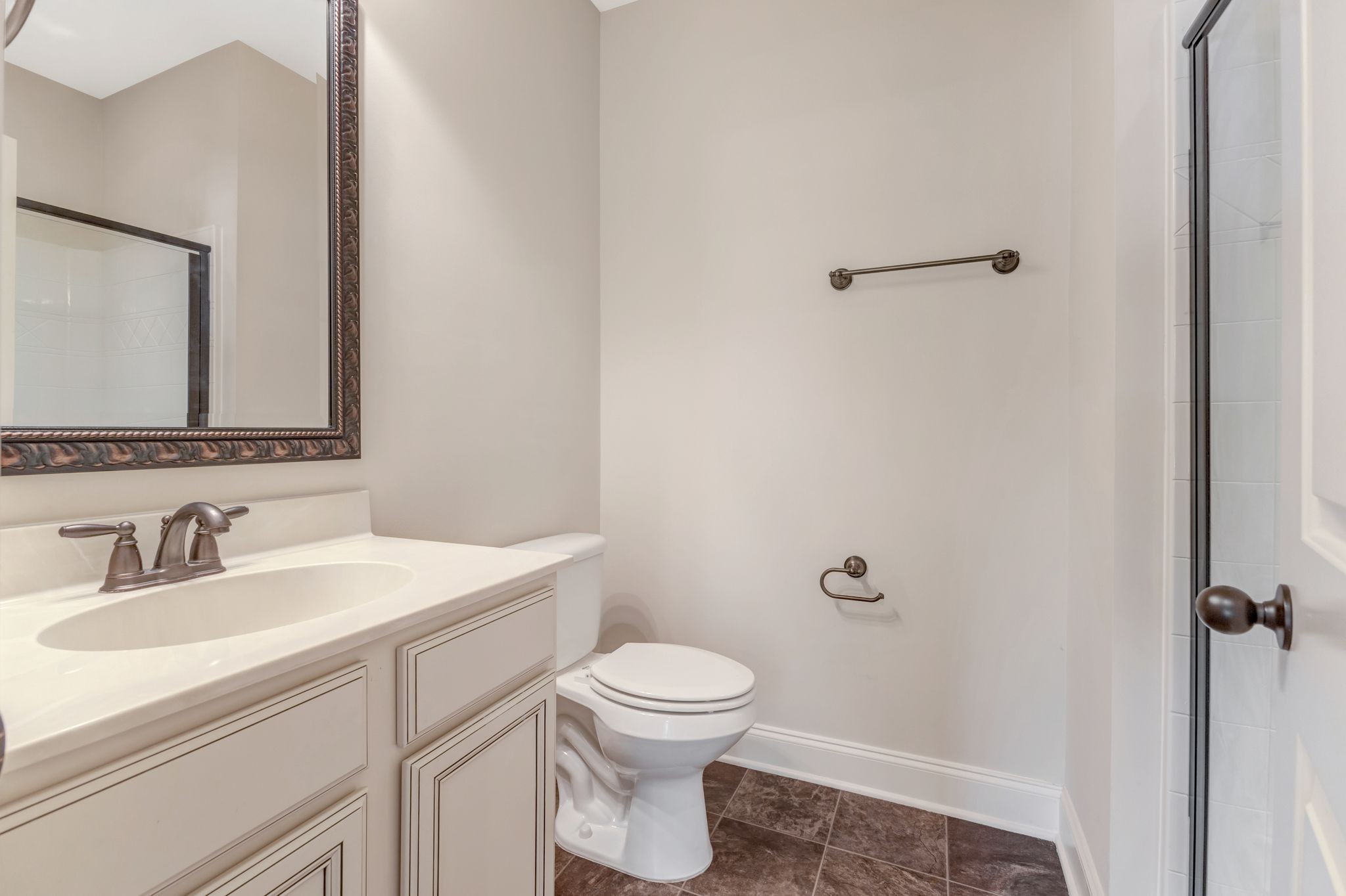 1201 Moher Boulevard Franklin, TN 37069 - Photo 12 of 35 a bathroom with a toilet a sink and mirror