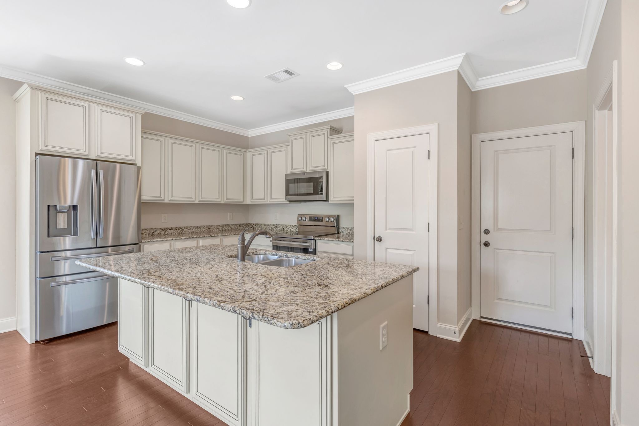 1201 Moher Boulevard Franklin, TN 37069 - Photo 16 of 35 a kitchen with stainless steel appliances granite countertop a refrigerator a stove and a sink