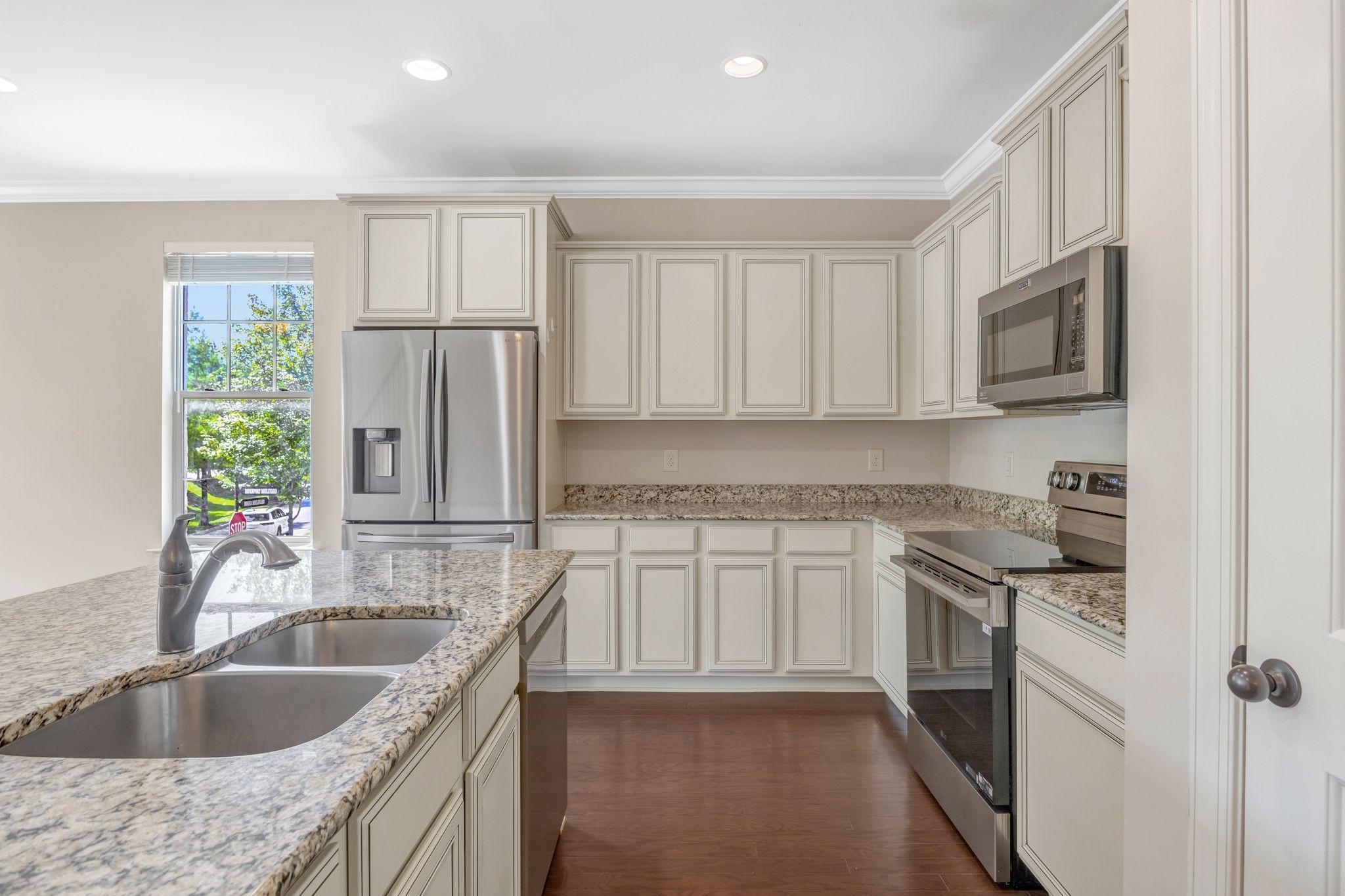 1201 Moher Boulevard Franklin, TN 37069 - Photo 17 of 35 a kitchen that has a sink cabinets counter space and stainless steel appliances