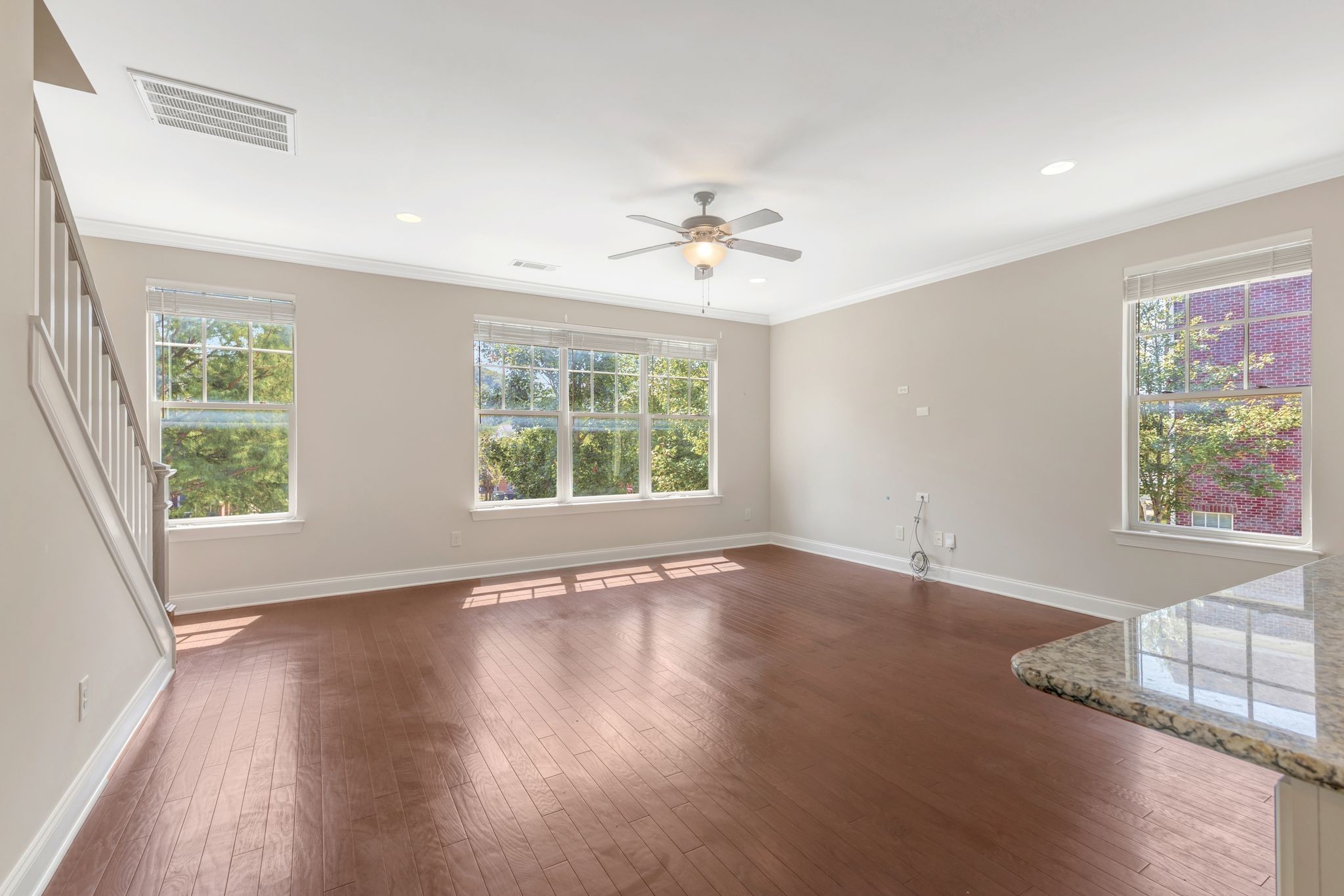 1201 Moher Boulevard Franklin, TN 37069 - Photo 20 of 35 a view of an empty room with wooden floor and a window