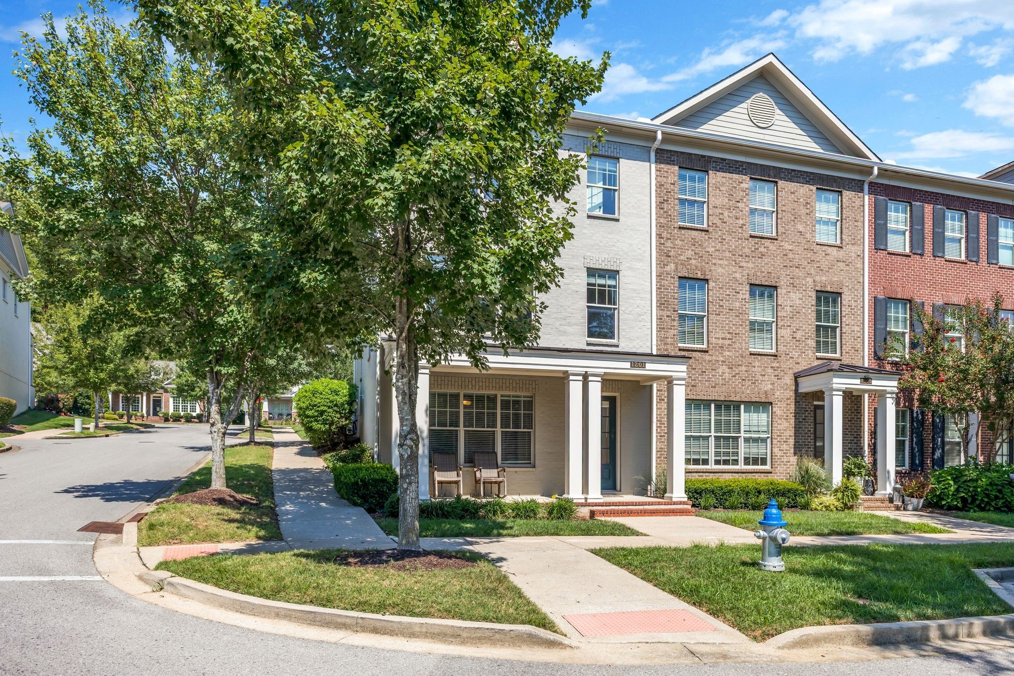 1201 Moher Boulevard Franklin, TN 37069 - Photo 2 of 35 a front view of a house with a yard and trees