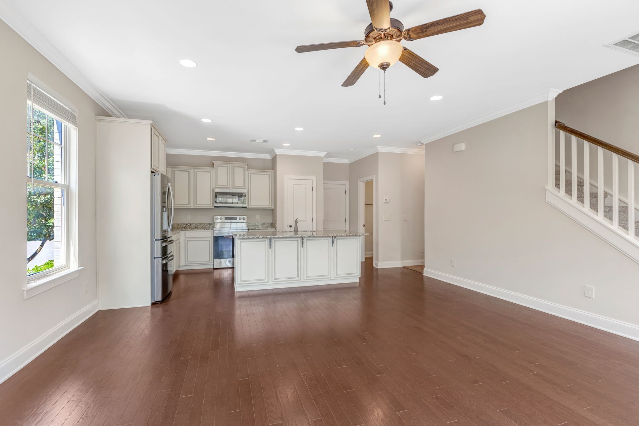 1201 Moher Boulevard Franklin, TN 37069 - Photo 21 of 35 a view of an empty room and window with wooden floor