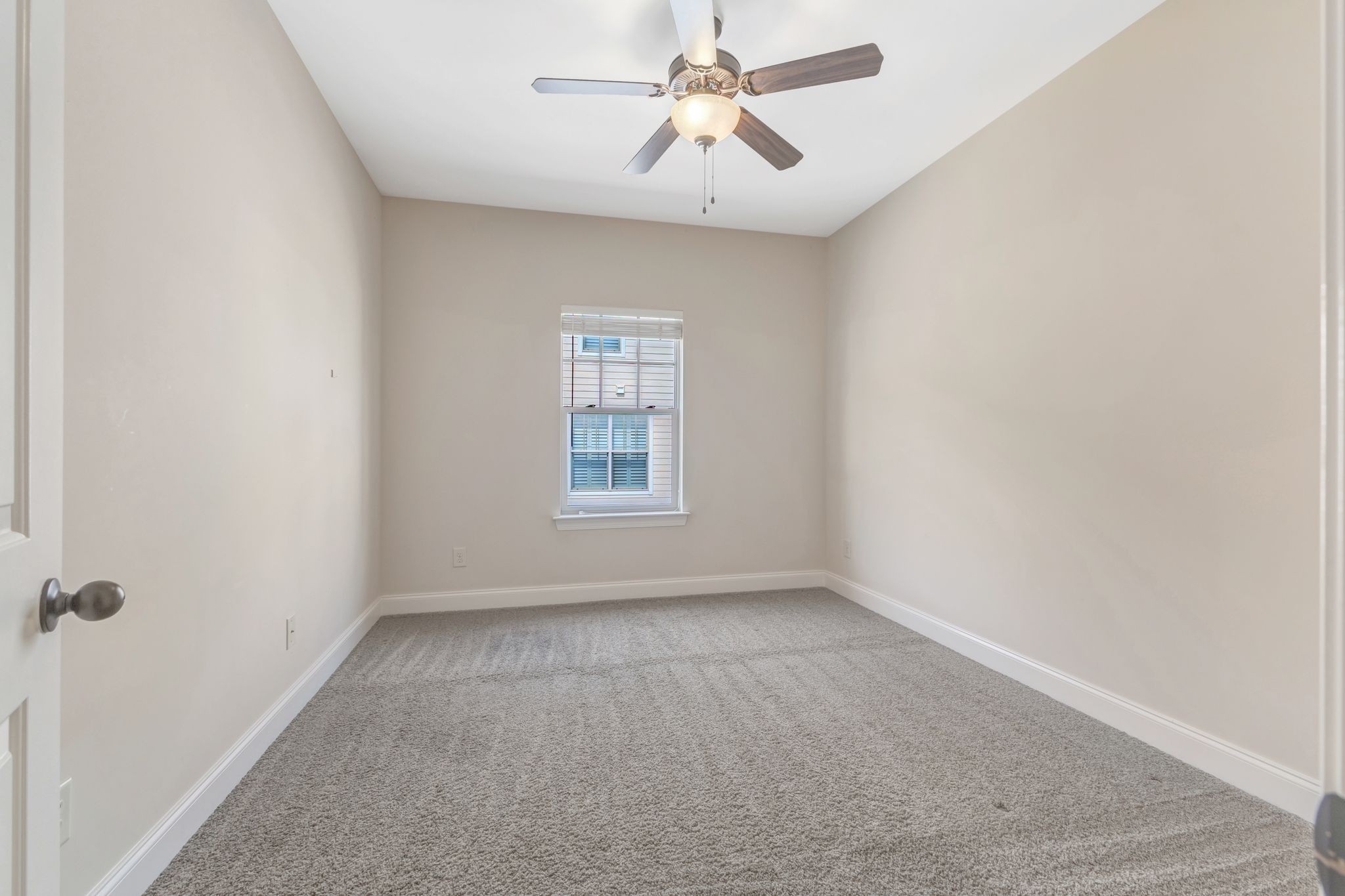 1201 Moher Boulevard Franklin, TN 37069 - Photo 31 of 35 an empty room with a window and a fan