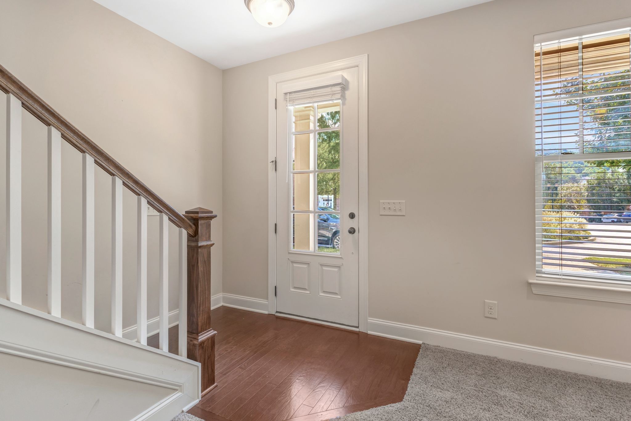 1201 Moher Boulevard Franklin, TN 37069 - Photo 6 of 35 an entryway with wooden floor and stairs