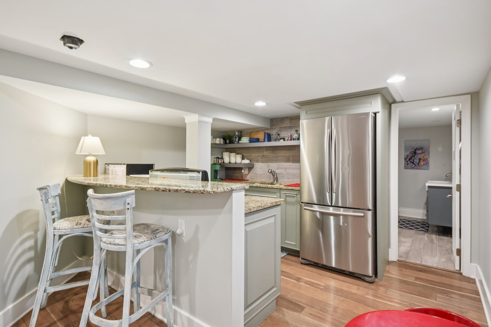 2928 North Rutherford Avenue Chicago, IL 60634 - Photo 18 of 25 a kitchen with white cabinets and stainless steel appliances