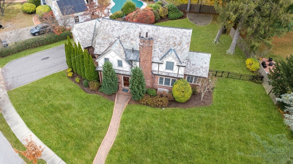 an aerial view of a house with garden