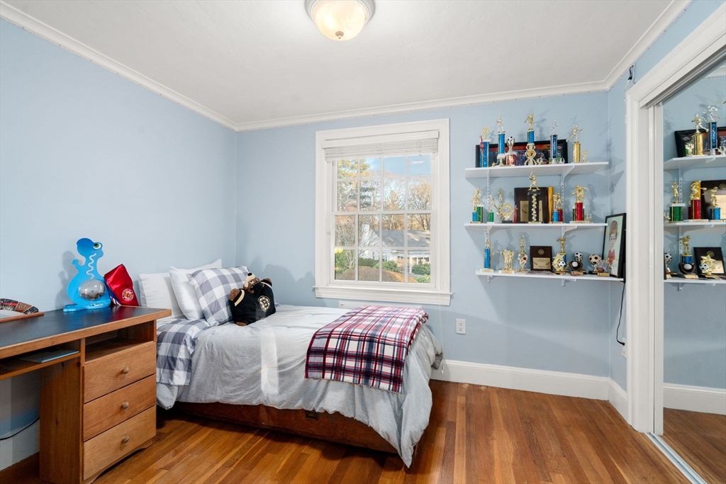 55 Evelyn Road Newton, MA 02468 - Photo 18 of 30 a bedroom with a bed and a window