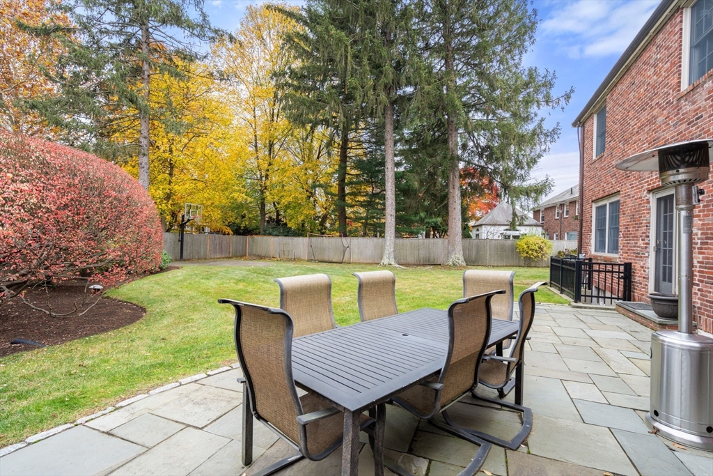 55 Evelyn Road Newton, MA 02468 - Photo 25 of 30 a view of an outdoor sitting area with furniture
