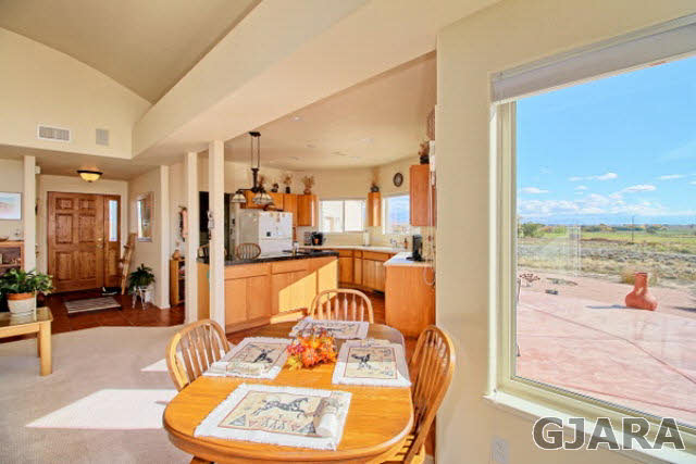 1701 O Road Fruita, CO 81521 - Photo 8 of 23 a living room with furniture and a large window