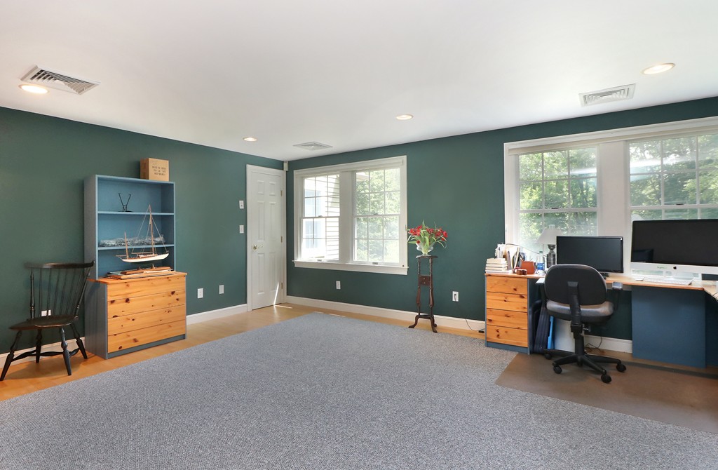 521 Marrett Road Lexington, MA 02421 - Photo 13 of 30 a workspace with furniture and a window