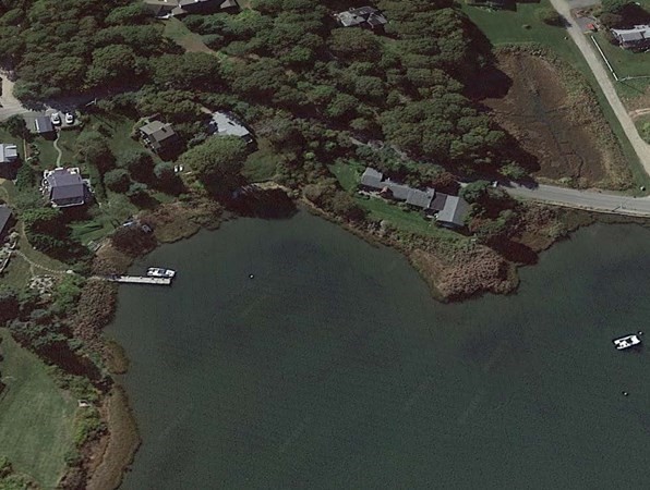 232 Lagoon Pond Road Tisbury, MA 02568 - Photo 1 of 31 an aerial view of a house with a yard