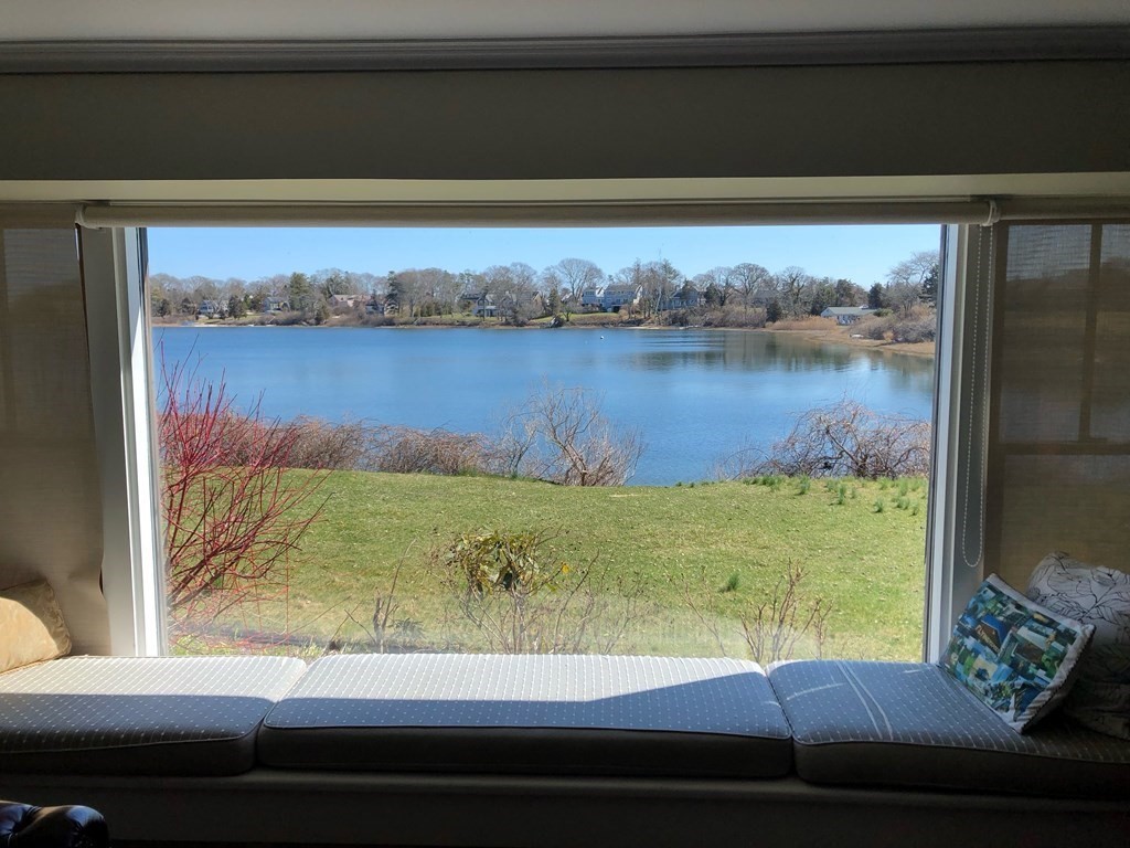 232 Lagoon Pond Road Tisbury, MA 02568 - Photo 12 of 31 a view of lake from a window