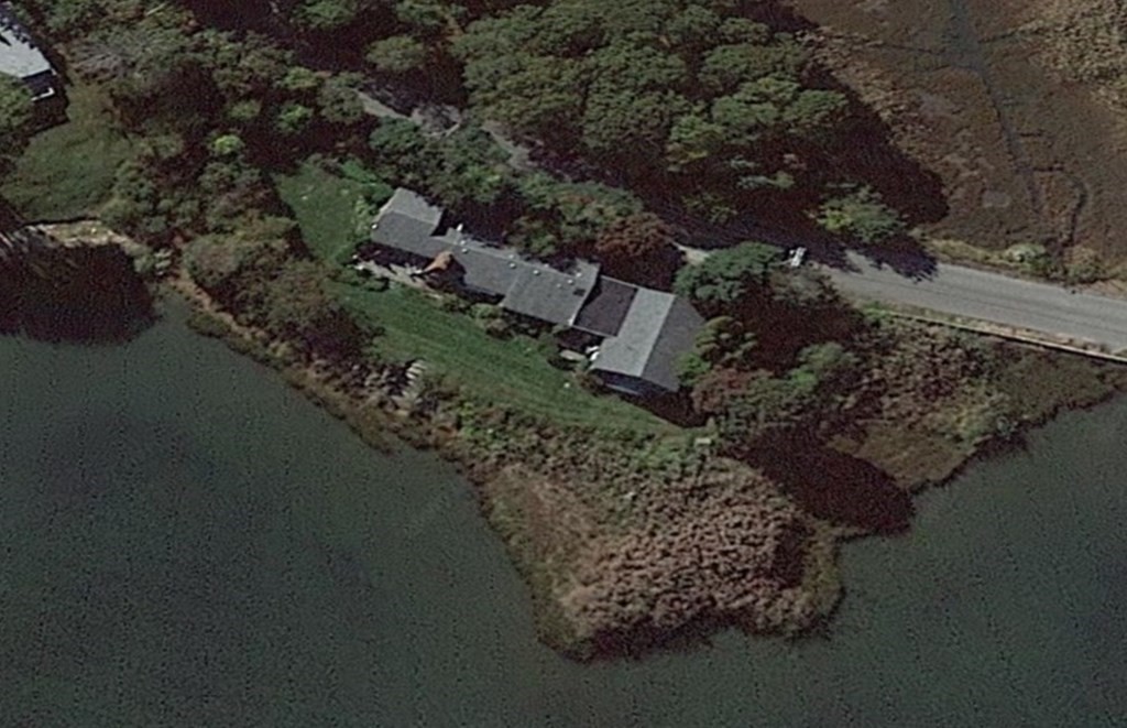 232 Lagoon Pond Road Tisbury, MA 02568 - Photo 2 of 31 aerial view of a house with a yard and lake view