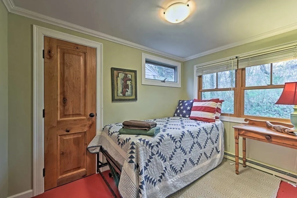232 Lagoon Pond Road Tisbury, MA 02568 - Photo 28 of 31 a bedroom with a bed and a window