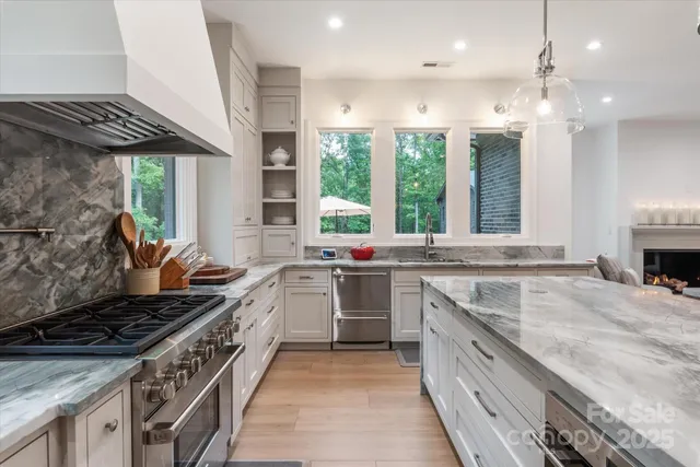 a kitchen with a stove and a sink