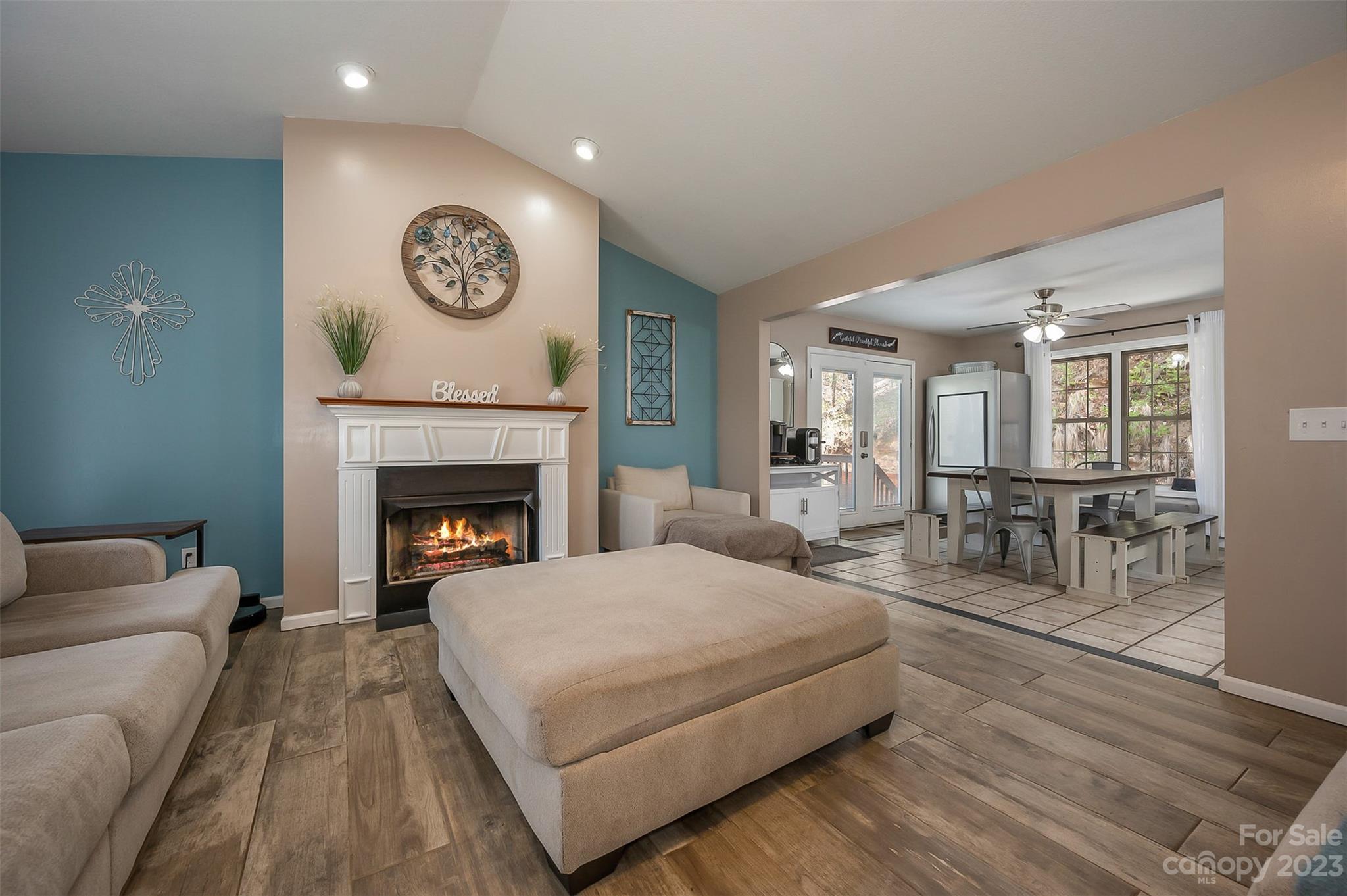 1251 Terrys Creek Road Zirconia, NC 28790 - Photo 12 of 48 a living room with furniture and a fireplace