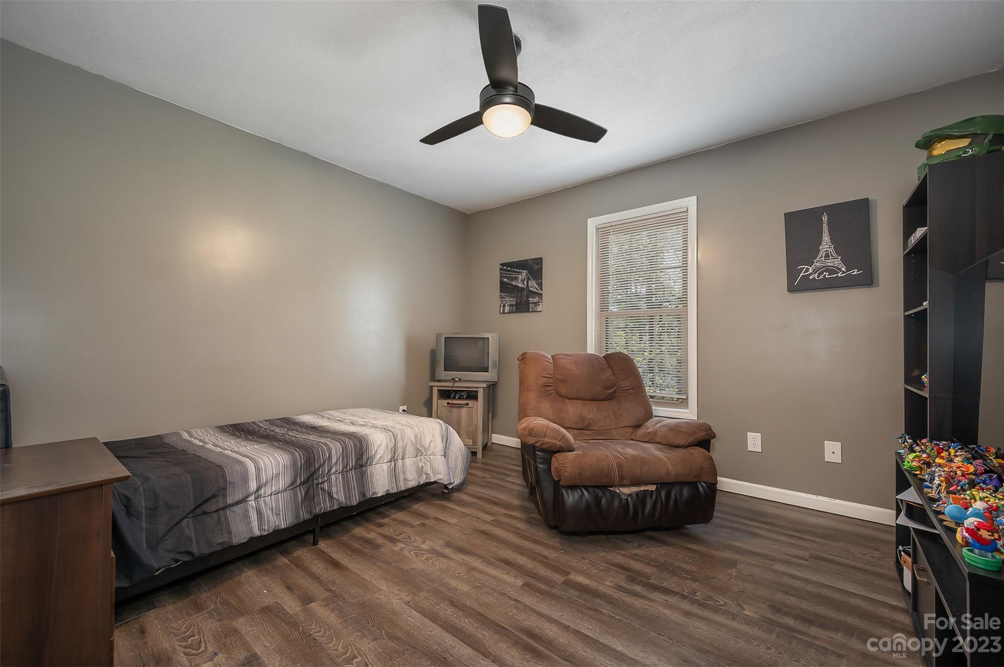 1251 Terrys Creek Road Zirconia, NC 28790 - Photo 16 of 48 a bedroom with bed and window