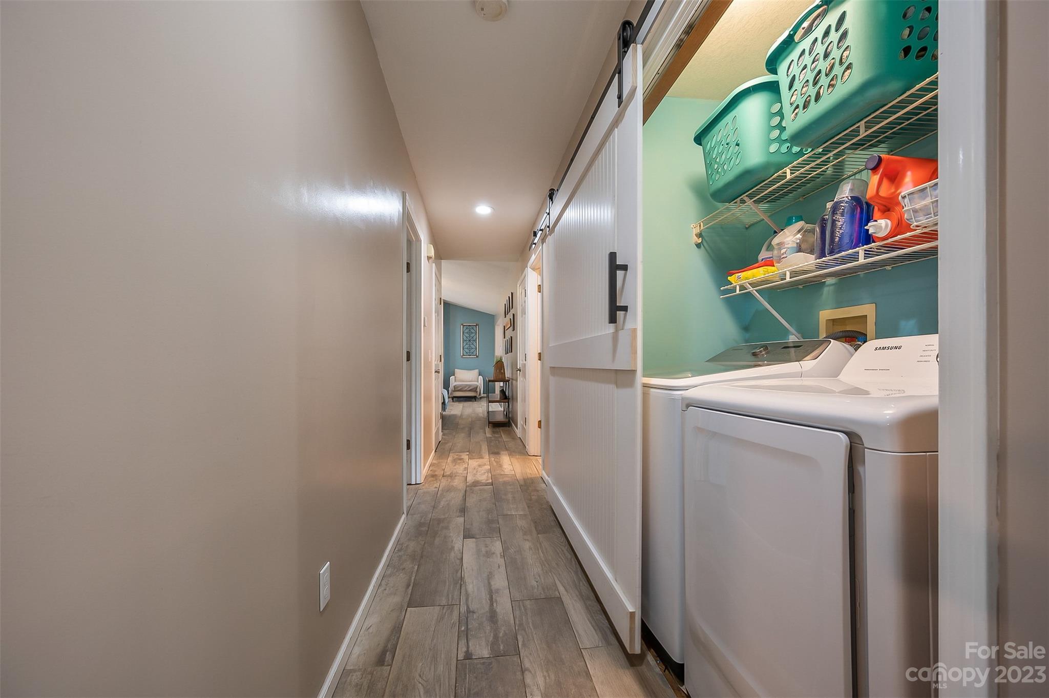 1251 Terrys Creek Road Zirconia, NC 28790 - Photo 18 of 48 a view of hallway with washer and dryer