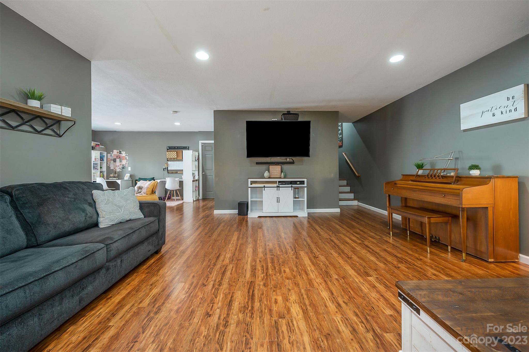 1251 Terrys Creek Road Zirconia, NC 28790 - Photo 24 of 48 a living room with furniture and a flat screen tv