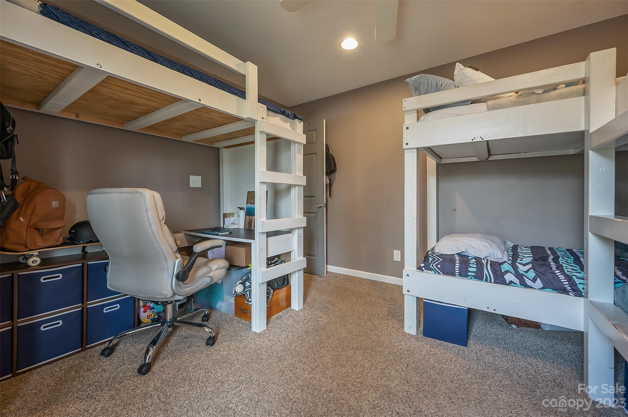 1251 Terrys Creek Road Zirconia, NC 28790 - Photo 29 of 48 a workspace with furniture and closet