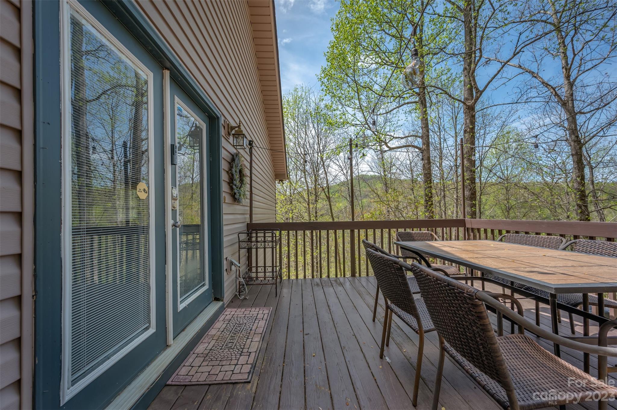 1251 Terrys Creek Road Zirconia, NC 28790 - Photo 34 of 48 a view of a two chairs on the roof deck
