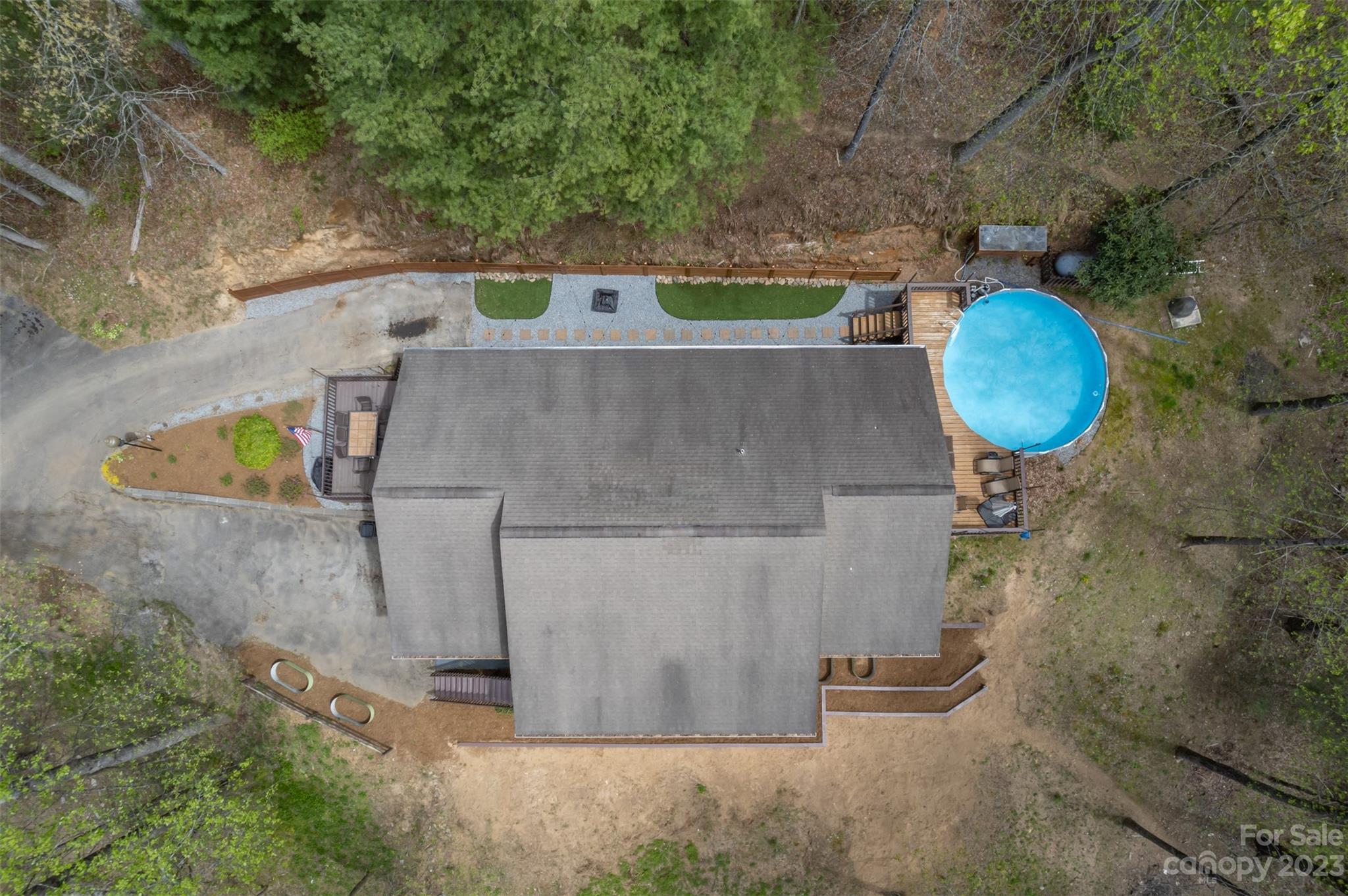 1251 Terrys Creek Road Zirconia, NC 28790 - Photo 43 of 48 an aerial view of a house with outdoor space