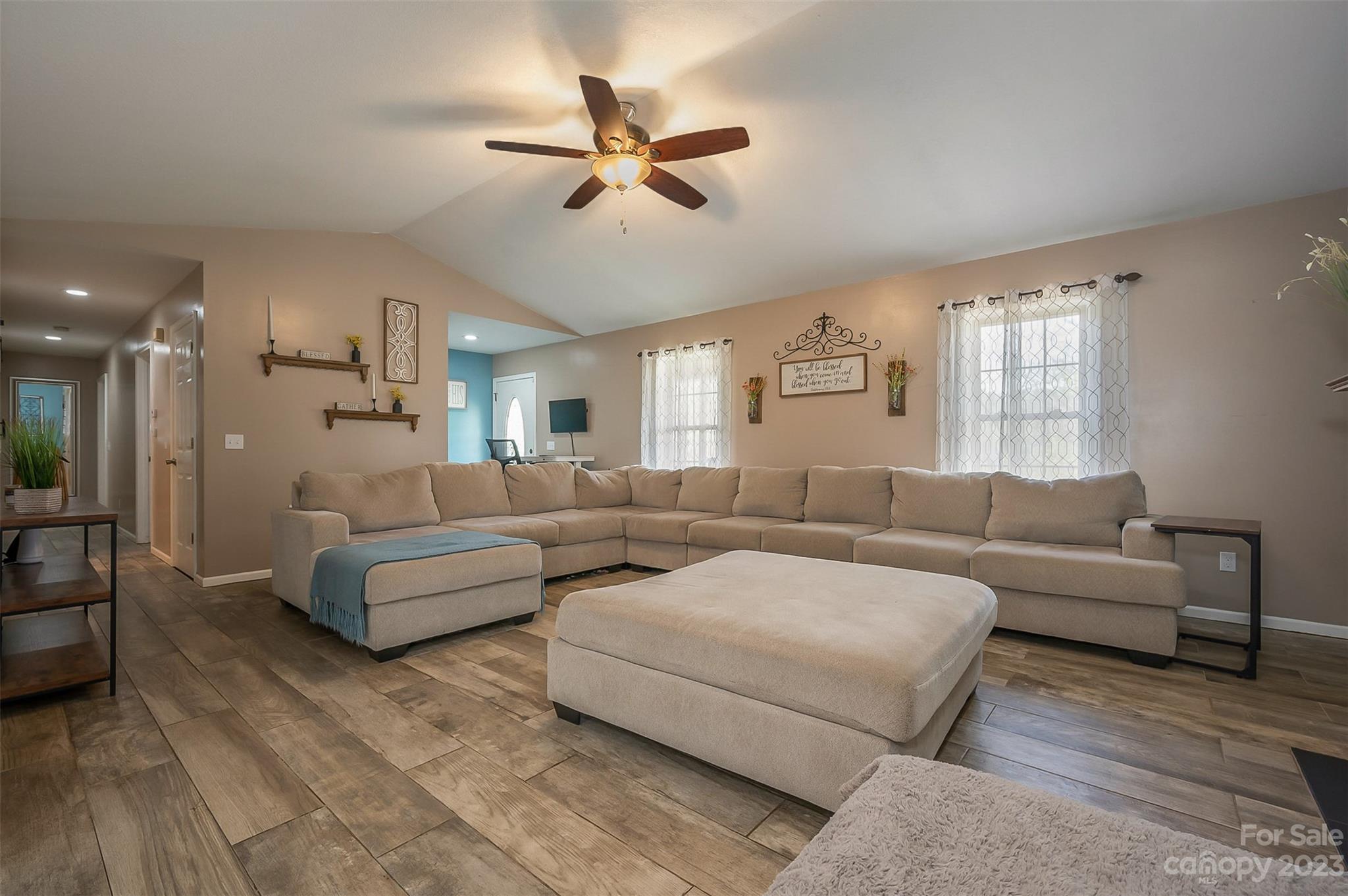 1251 Terrys Creek Road Zirconia, NC 28790 - Photo 9 of 48 a living room with furniture and a ceiling fan