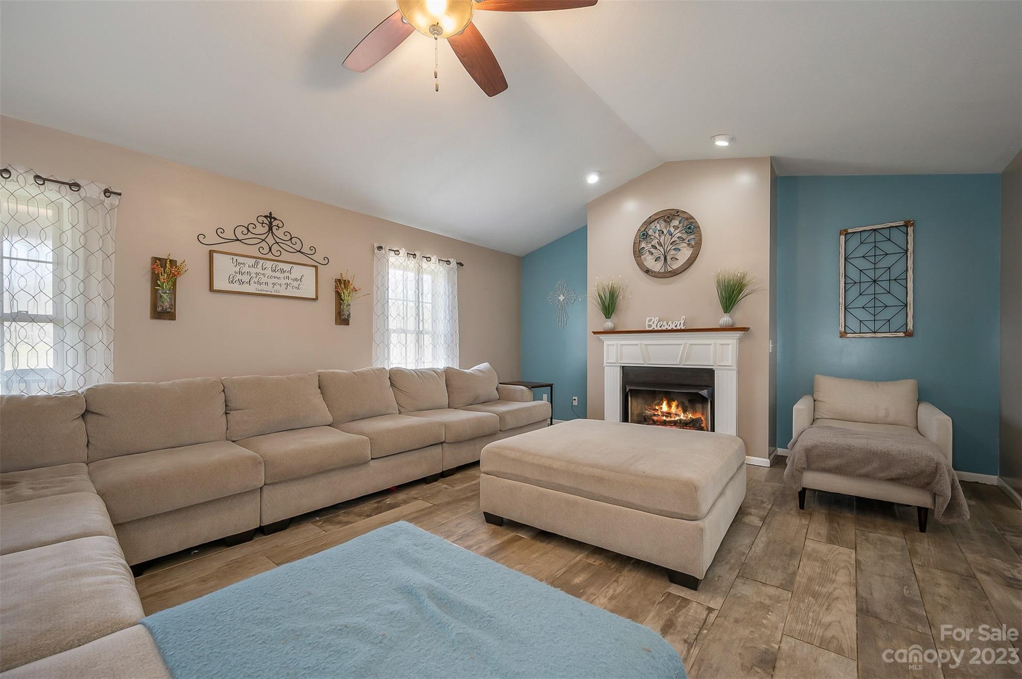 1251 Terrys Creek Road Zirconia, NC 28790 - Photo 10 of 48 a living room with furniture and a fireplace