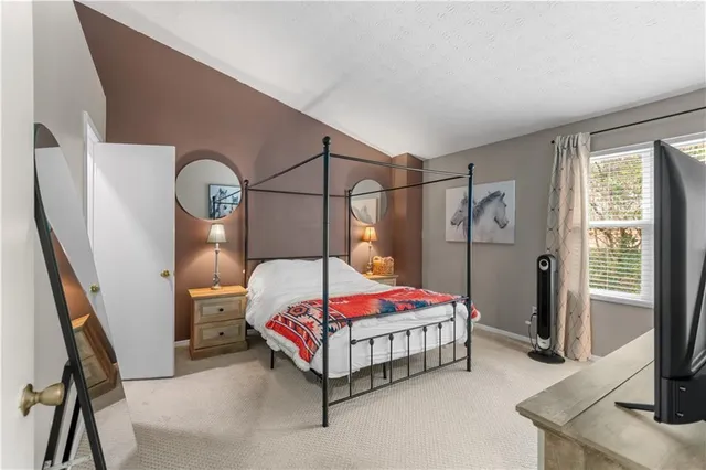 a balcony with furniture and wooden floor