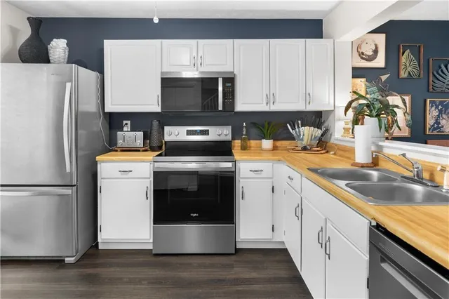 a potted plant sitting in front of a house