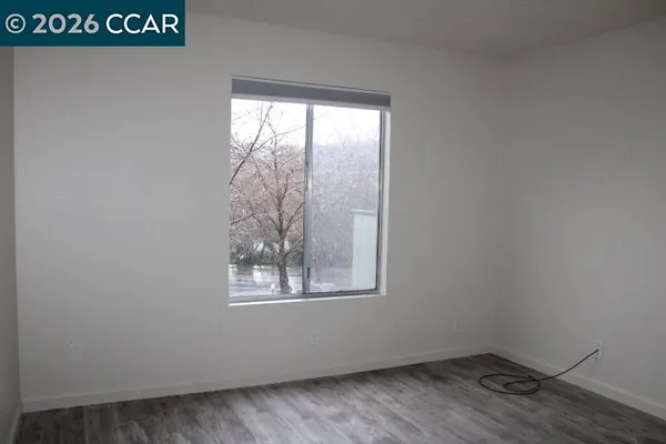 a view of a window in an empty room