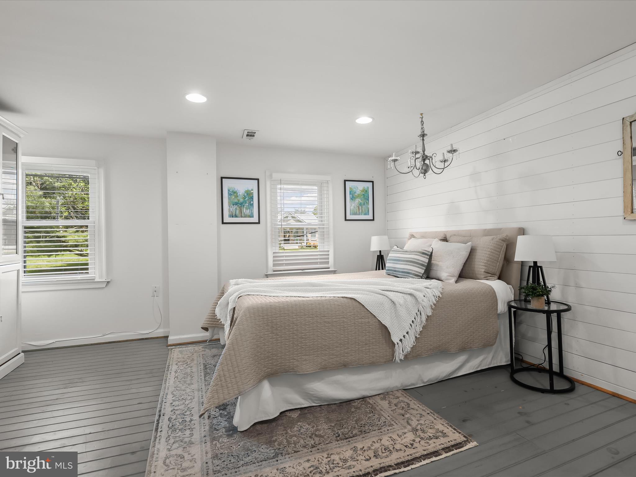 1501 Long Corner Road Mount Airy, MD 21771 - Photo 31 of 116 a spacious bedroom with a bed and a window