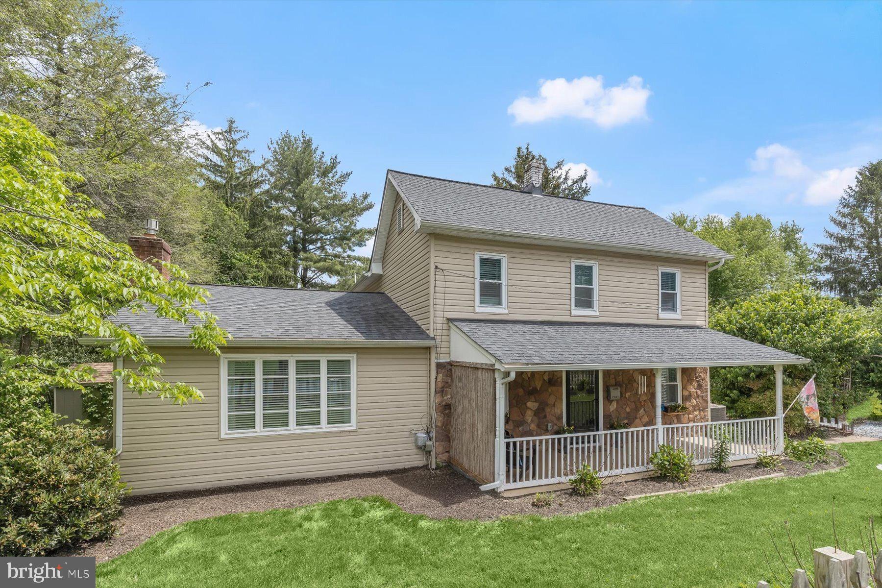 1501 Long Corner Road Mount Airy, MD 21771 - Photo 41 of 116 front view of a house with a yard