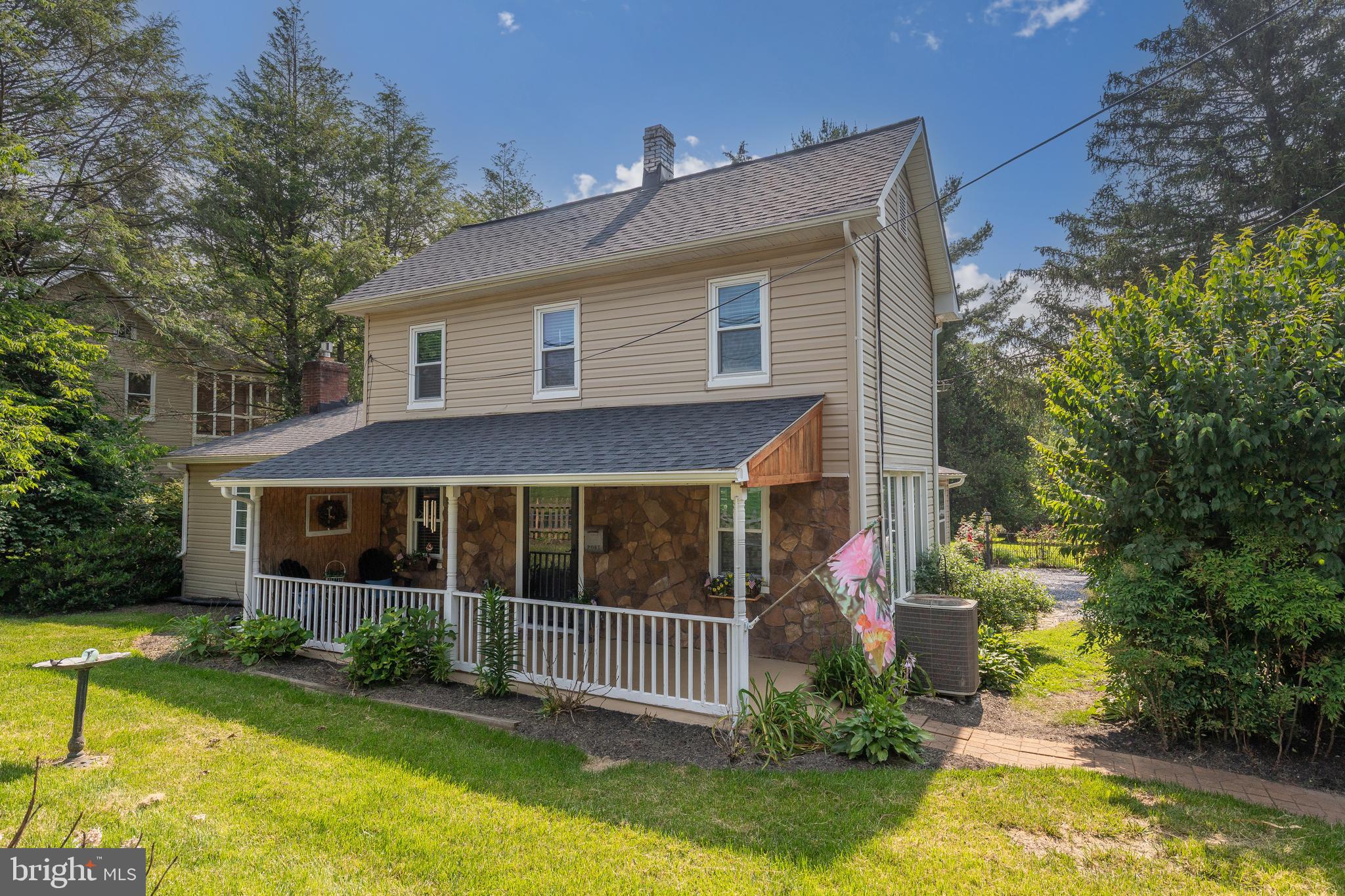 1501 Long Corner Road Mount Airy, MD 21771 - Photo 77 of 116 a front view of house with yard and green space