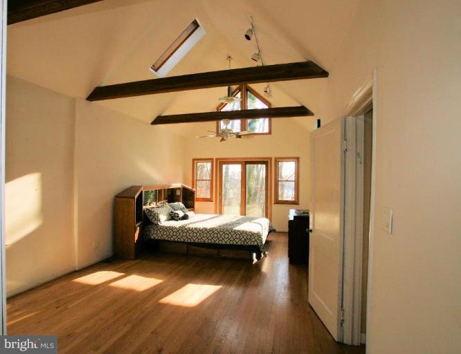 466 Forelands Road Annapolis, MD 21401 - Photo 9 of 30 Cathedral beamed ceilings and expansive waterviews