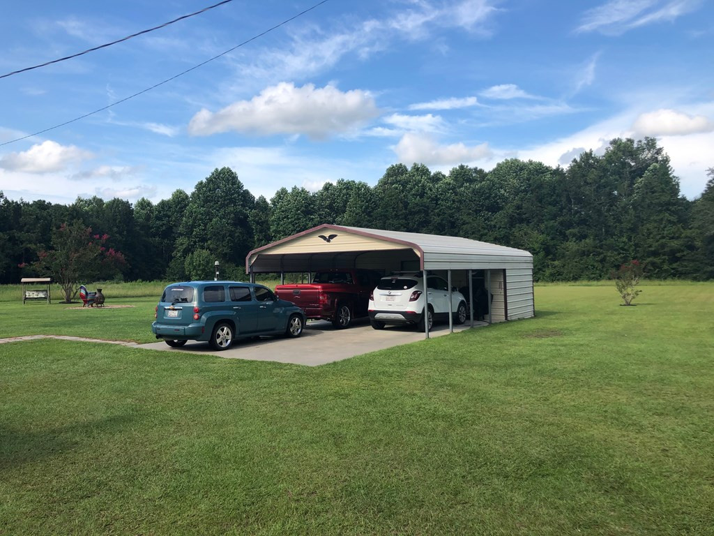 626 Indian Road Bowman, SC 29018 - Photo 27 of 27 car port with storage