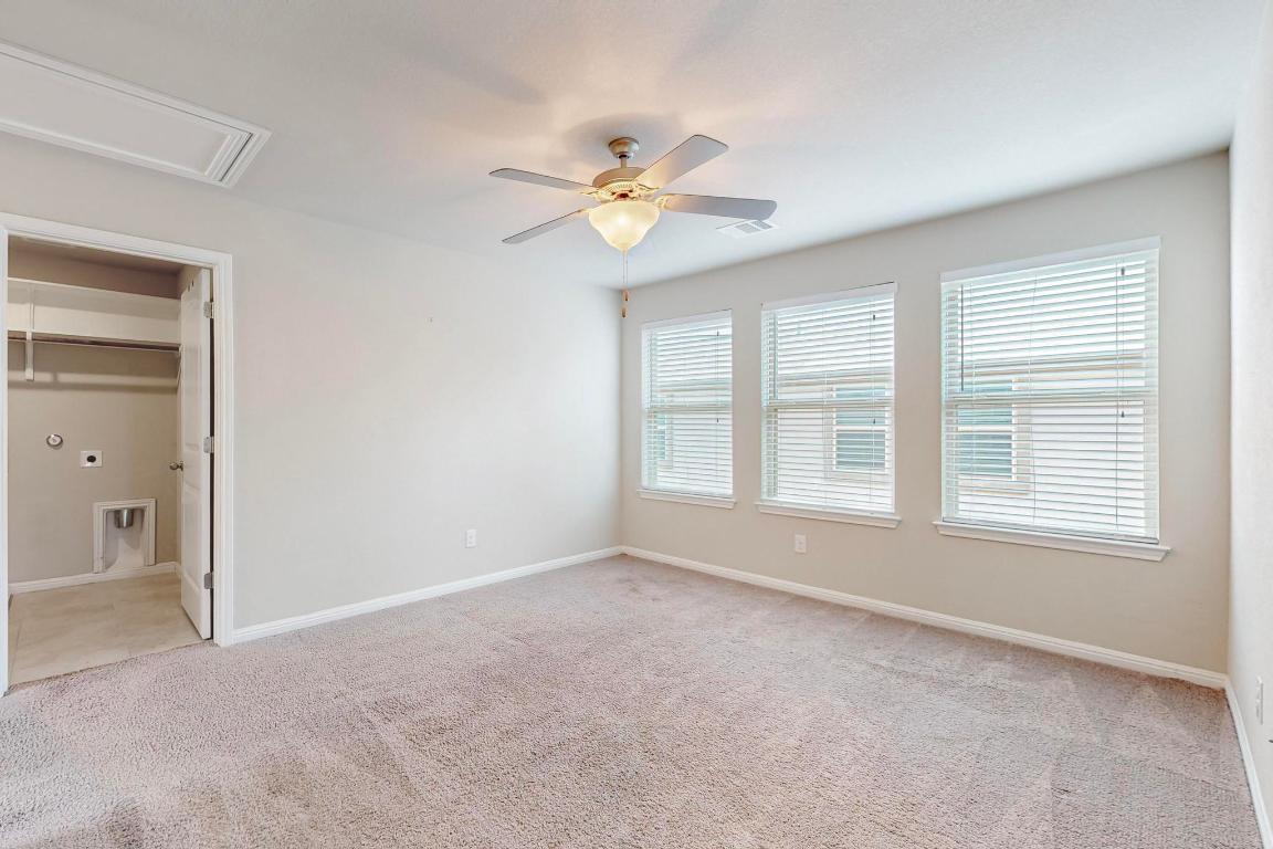 2908 Harvester Lane Round Rock, TX 78664 - Photo 16 of 40 a view of an empty room with a window