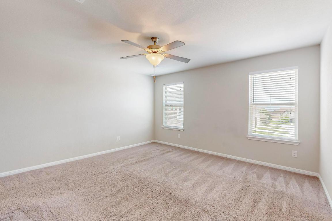 2908 Harvester Lane Round Rock, TX 78664 - Photo 18 of 40 a view of an empty room with a window