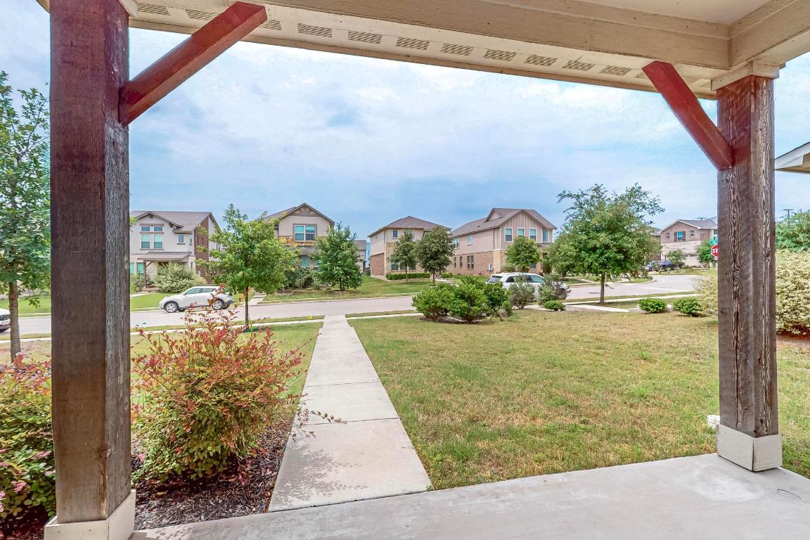 2908 Harvester Lane Round Rock, TX 78664 - Photo 2 of 40 a view of a porch and a yard