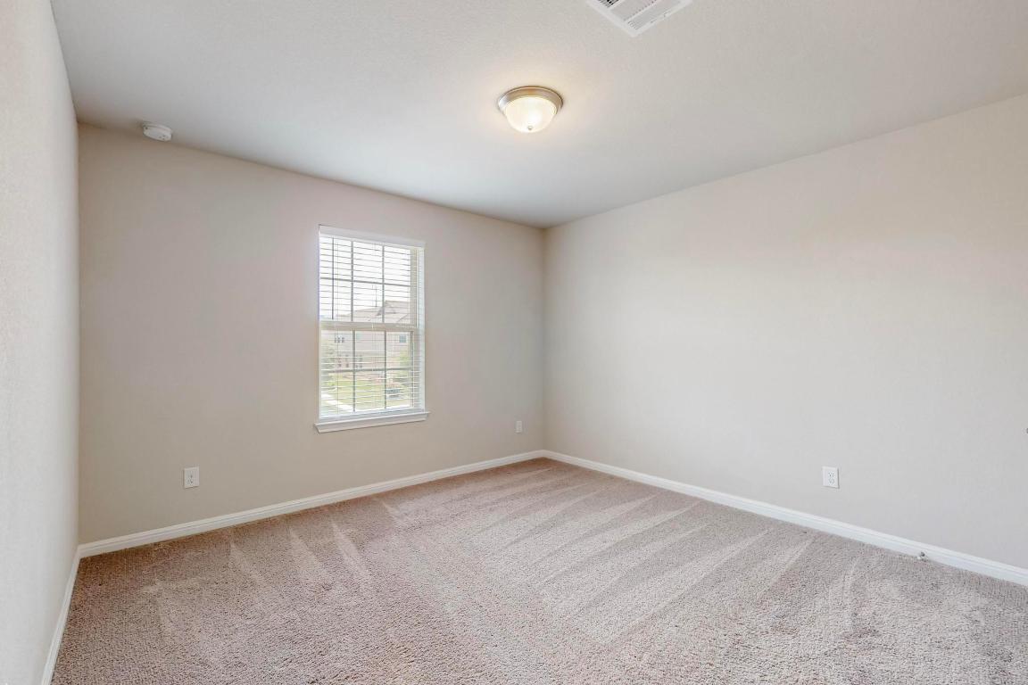 2908 Harvester Lane Round Rock, TX 78664 - Photo 23 of 40 an empty room with a window