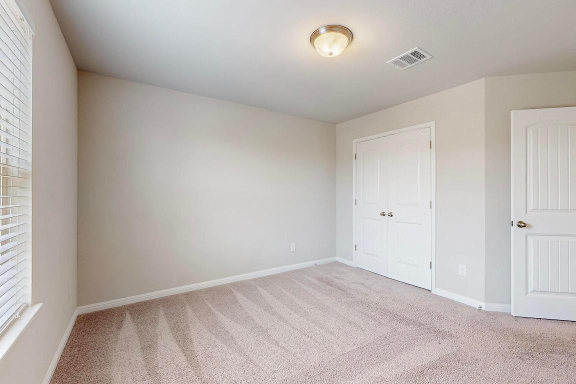 2908 Harvester Lane Round Rock, TX 78664 - Photo 24 of 40 an empty room with a empty space and a window