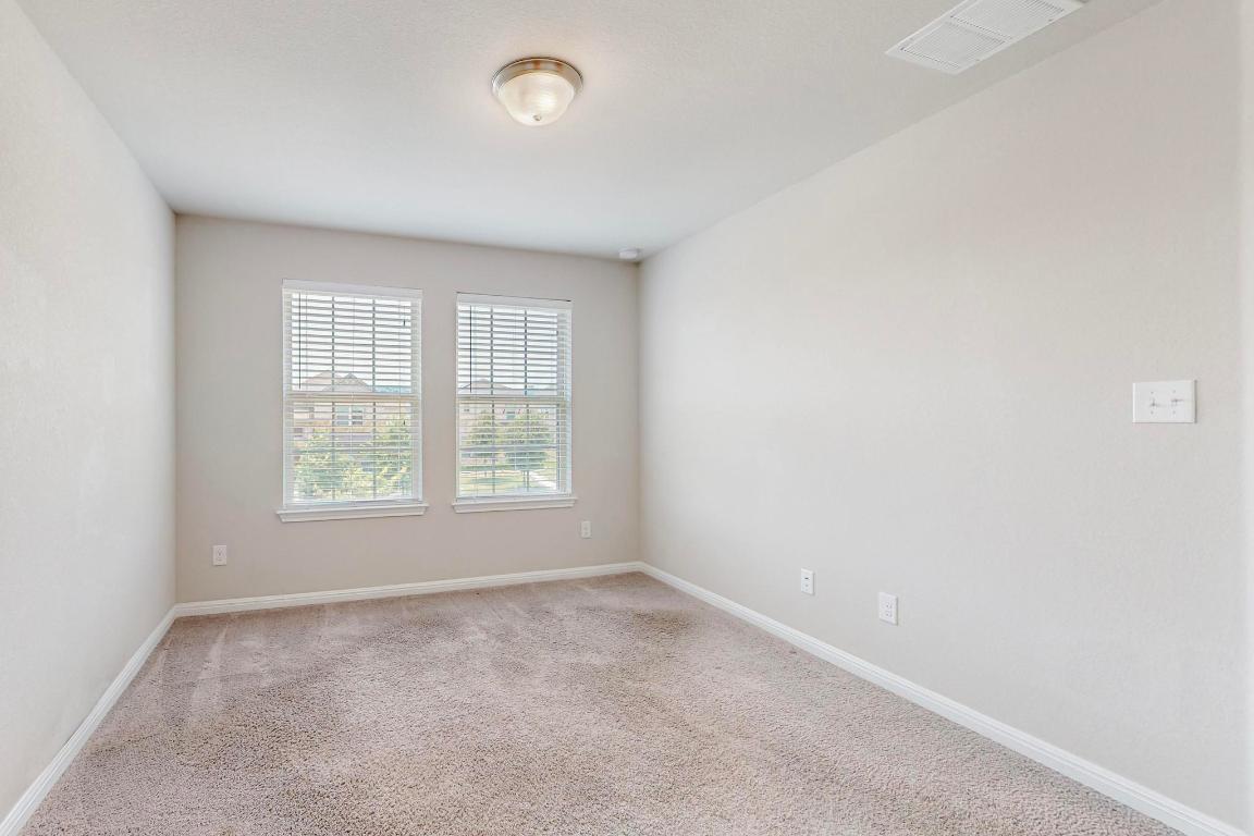2908 Harvester Lane Round Rock, TX 78664 - Photo 28 of 40 an empty room with a window
