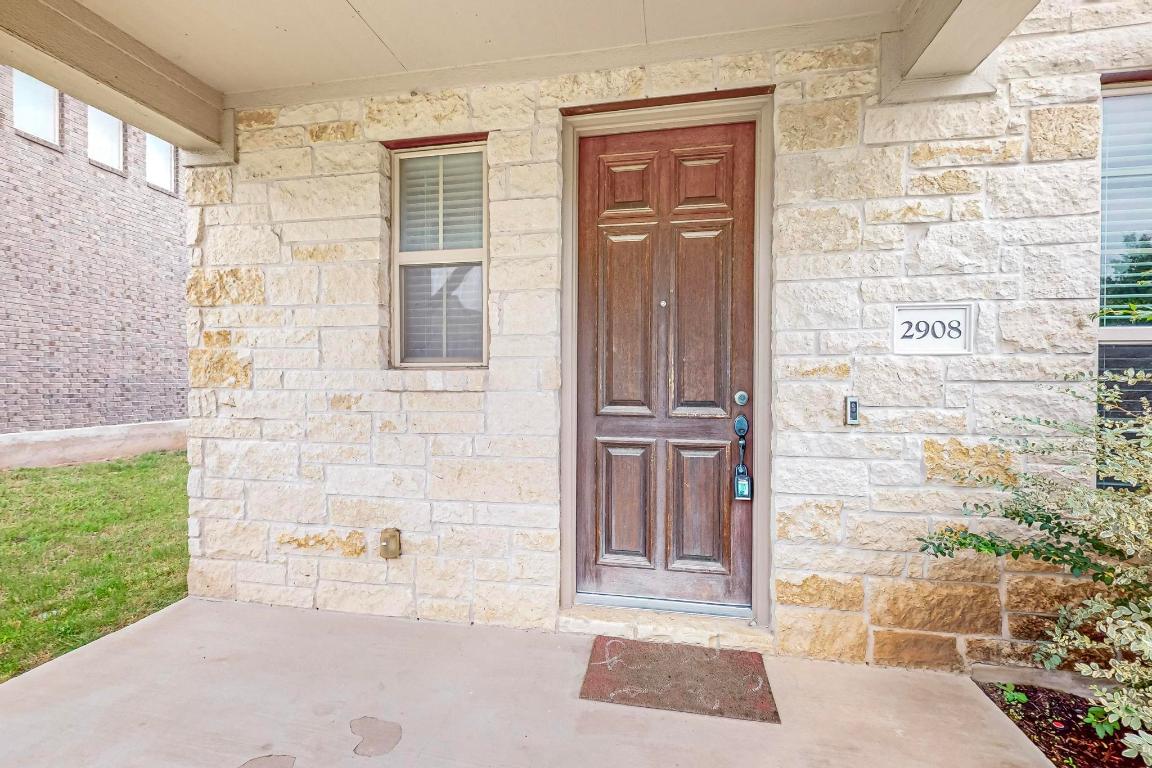 2908 Harvester Lane Round Rock, TX 78664 - Photo 3 of 40 a view of a door of the house
