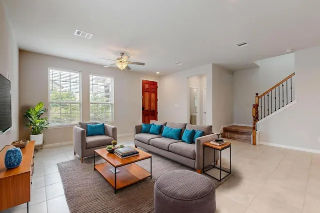 a kitchen with granite countertop stainless steel appliances and wooden cabinets