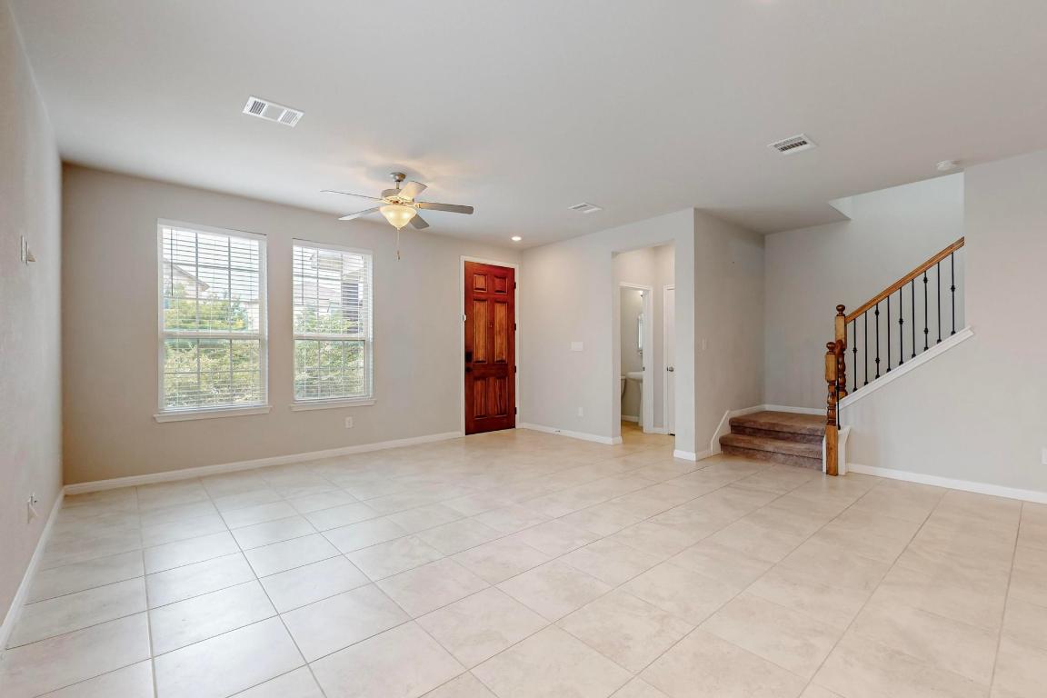 2908 Harvester Lane Round Rock, TX 78664 - Photo 5 of 40 a view of an empty room with a window