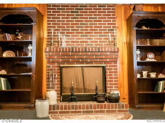 6433 Commander Road Richmond, VA 23224 - Photo 13 of 21 a front view of a house with glass windows