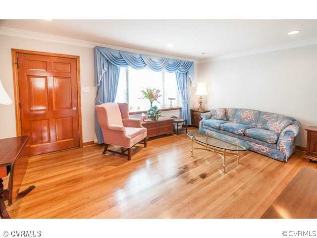 6433 Commander Road Richmond, VA 23224 - Photo 15 of 21 a living room with furniture and a large window